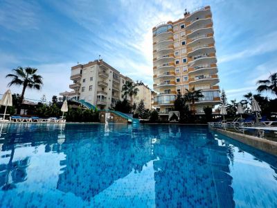 Zariadený byt s výhľadom na more na predaj Mahmutlar Alanya APM