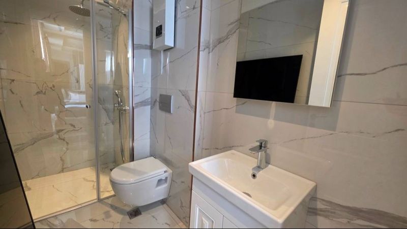 Luxusný apartmán na predaj v Alanyi – prvá línia pri mori, moderná rezidencia s výhľadom na more APM - 11